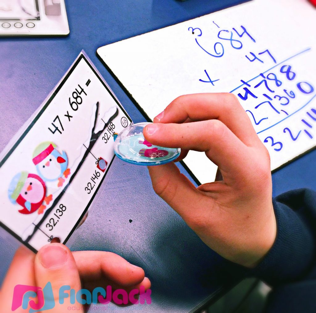 http://www.teacherspayteachers.com/Product/Winter-Multiple-Digit-Multiplication-Poke-Cards-1603112